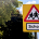 School crossing warning sign with children silhouettes